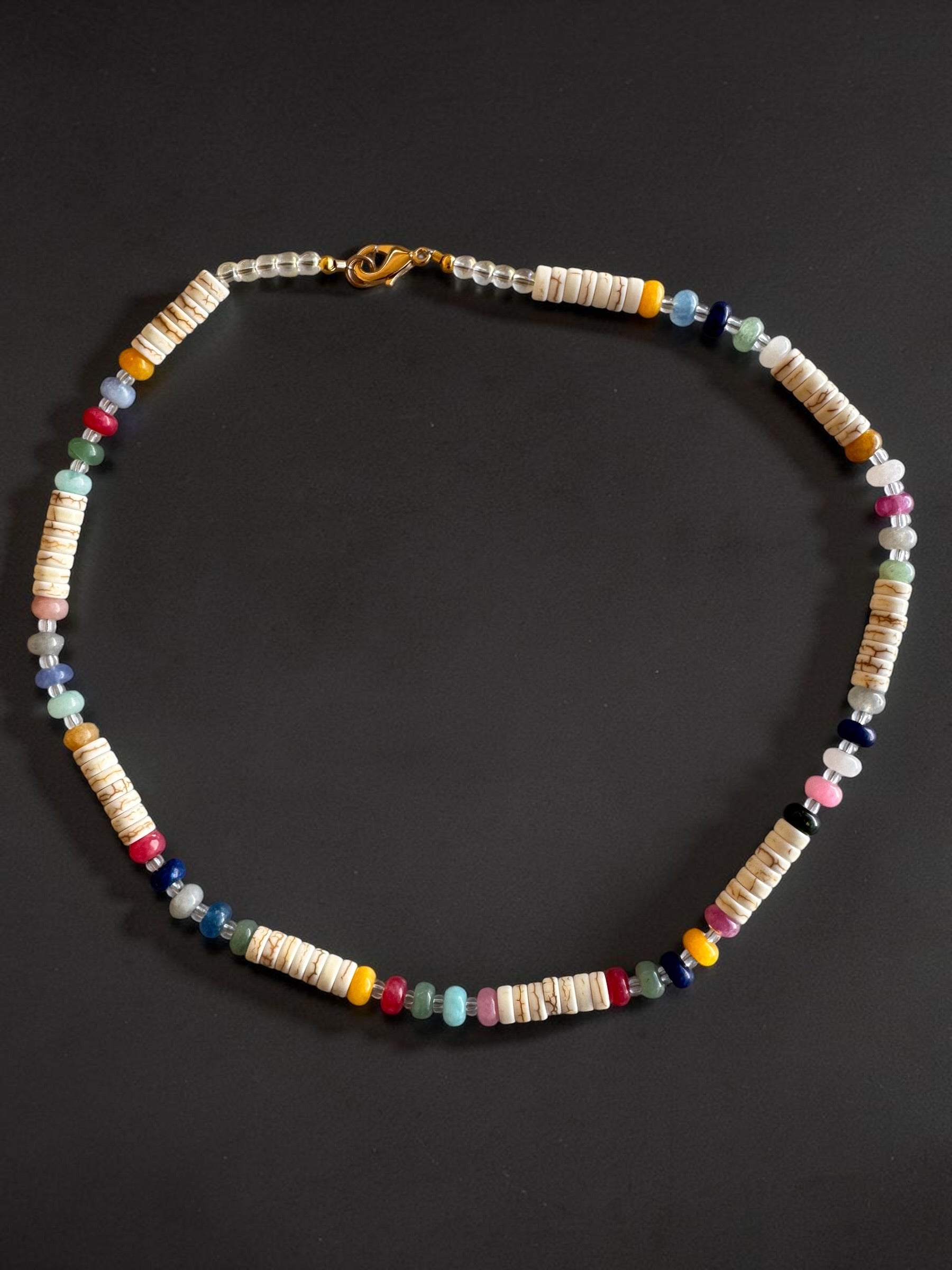 surfer tide necklace