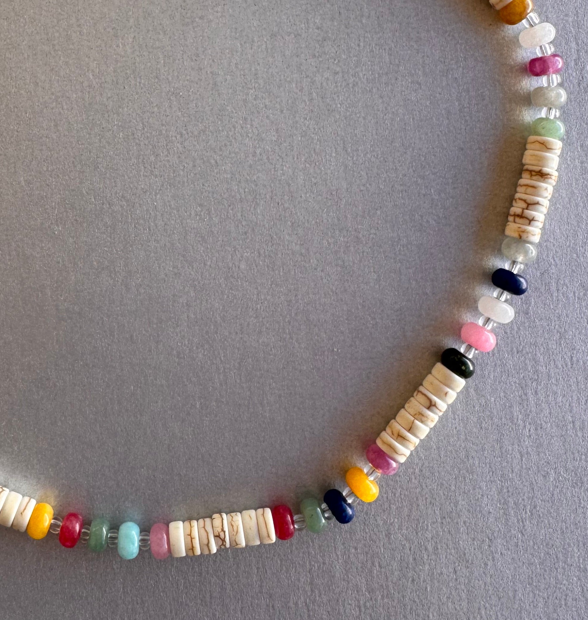 surfer tide necklace
